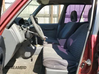 1999 Toyota RAV4 with VIN JT3GP10V5X0036101, listed as a Copart auction lot 50435375 with 253,917 mi miles and Salvage Title. Bid and sale history available at DreamBid. Image 7.