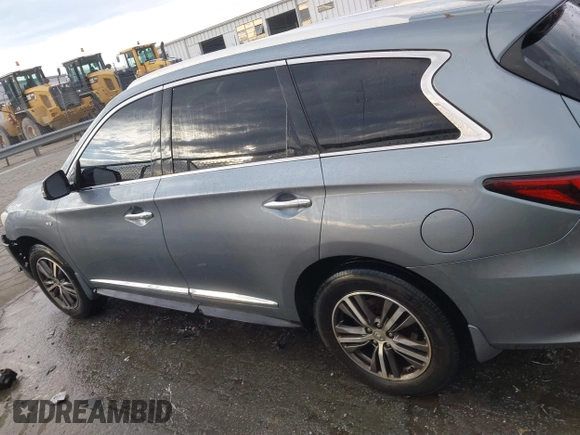 2016 Infiniti QX60 with VIN 5N1AL0MM9GC504320, listed as a IAAI auction lot 41290382 with 71,358 mi miles and . Bid and sale history available at DreamBid. Image 14.