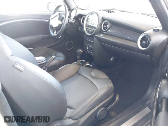 2014 MINI Convertible S with VIN WMWZP3C5XET706911, listed as a IAAI auction lot 42217410 with 54,649 mi miles and . Bid and sale history available at DreamBid. Image 5.