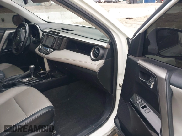 2016 Toyota RAV4 Limited with VIN JTMYFREV2GJ065656, listed as a IAAI auction lot 42575320 with 124,648 mi miles and . Bid and sale history available at DreamBid. Image 5.
