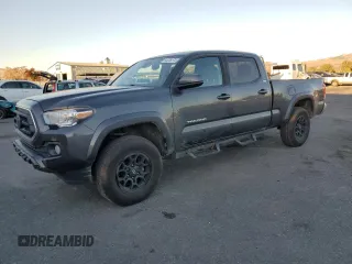 2020 Toyota Tacoma SR5 with VIN 3TMBZ5DN5LM023888, listed as a Copart auction lot 84208174 with 131,858 mi miles and Salvage title. Bid and sale history available at DreamBid. Image 1.