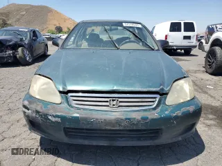 2000 Honda Civic VP z VIN 2HGEJ6619YH556175, wystawiony jako Copart lot #57518555 z przebiegiem 153 087 mil mil oraz Czysty tytuł • Clean title. Historia ofert i sprzedaży dostępna na DreamBid. Obrazek 5.