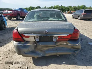 2004 Mercury Grand Marquis LS Premium z VIN 2MEFM75W34X688862, wystawiony jako Copart lot #56801635 z przebiegiem 150 371 mil mil oraz Szkody całkowita. Historia ofert i sprzedaży dostępna na DreamBid. Obrazek 6.