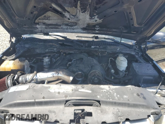2005 Cadillac Escalade z VIN 1GYEK63N55R212898, wystawiony jako Copart lot #54323405 z przebiegiem Nie podano mil oraz Szkoda całkowita • Salvage title. Historia ofert i sprzedaży dostępna na DreamBid. Obrazek 12.