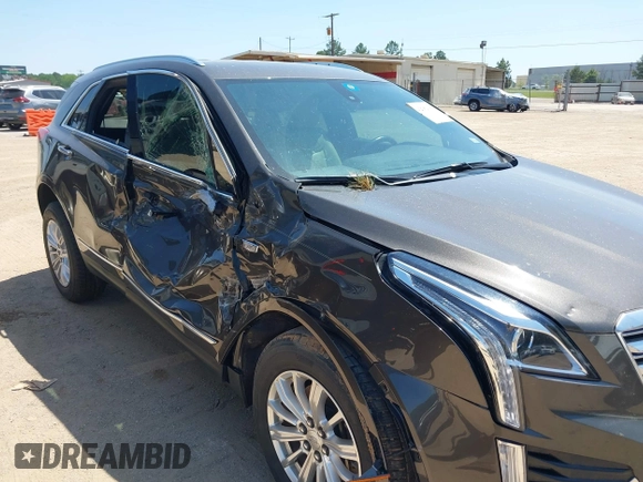 2019 Cadillac XT5 FWD z VIN 1GYKNARS1KZ235083, wystawiony jako IAAI lot #42002995 z przebiegiem 117 430 mil mil oraz . Historia ofert i sprzedaży dostępna na DreamBid. Obrazek 6.