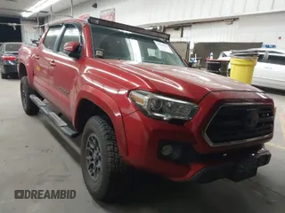 2018 Toyota Tacoma SR with VIN 3TMCZ5AN0JM166978, listed as a IAAI auction lot 41936143 with 129,674 mi miles. Bid and sale history available at carsss.com. Image 1.