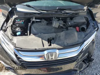 2019 Honda Odyssey Touring with VIN 5FNRL6H84KB014970, listed as a Copart auction lot 53571835 with 116,219 mi miles and Salvage title. Bid and sale history available at DreamBid. Image 12.