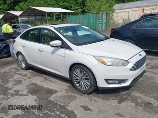 2018 Ford Focus Titanium with VIN 1FADP3J22JL314771, listed as a IAAI auction lot 42364324 with 105,774 mi miles and . Bid and sale history available at DreamBid. Image 1.
