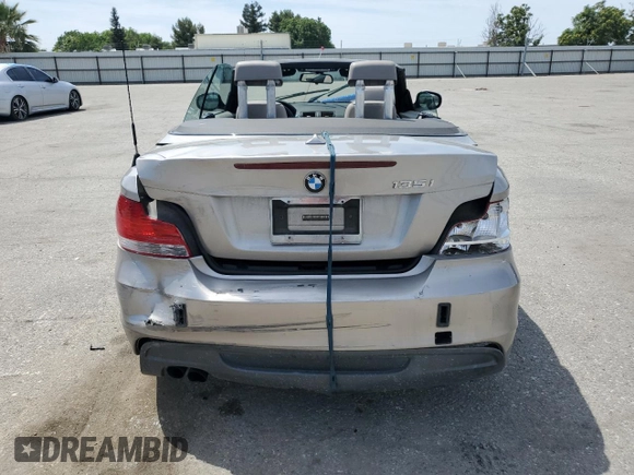 2010 BMW 1 Series 135i with VIN WBAUN9C55AVK41973, listed as a Copart auction lot 54609015 with 144,685 mi miles and Salvage Title. Bid and sale history available at carsss.com. Image 6.