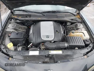 2008 Dodge Charger R/T with VIN 2B3KA53H58H188379, listed as a IAAI auction lot 41895792 with 136,442 mi miles and . Bid and sale history available at carsss.com. Image 10.
