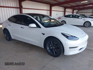 2021 Tesla Model 3 Long Range with VIN 5YJ3E1EB3MF003027, listed as a IAAI auction lot 41859036 with 102,302 mi miles and . Bid and sale history available at carsss.com. Image 1.