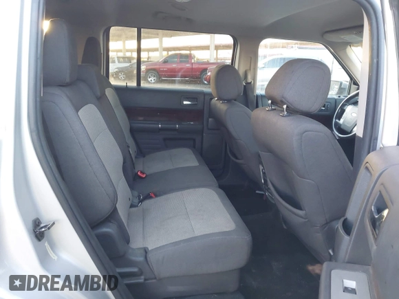 2012 Ford Flex SEL z VIN 2FMGK5CC0CBD03242, wystawiony jako IAAI lot #42159585 z przebiegiem 155 128 mil mil oraz . Historia ofert i sprzedaży dostępna na DreamBid. Obrazek 8.