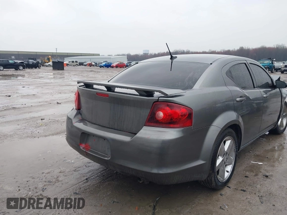 2013 Dodge Avenger SE with VIN 1C3CDZAB5DN563953, listed as a IAAI auction lot 41996115 with 112,040 mi miles. Bid and sale history available at carsss.com. Image 4.