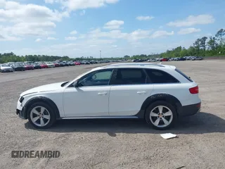 2015 Audi allroad Premium Plus with VIN WA1UFAFLXFA055527, listed as a IAAI auction lot 41760426 with 130,238 mi miles. Bid and sale history available at carsss.com. Image 14.