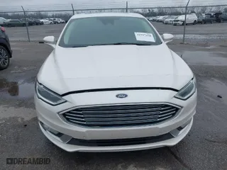 2017 Ford Fusion Energi Titanium with VIN 3FA6P0SU7HR191665, listed as a IAAI auction lot 41597438 with 166,570 mi miles. Bid and sale history available at carsss.com. Image 12.