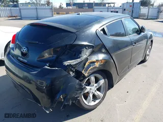 2015 Hyundai Veloster RE:FLEX with VIN KMHTC6AD7FU224291, listed as a IAAI auction lot 41517267 with 151,554 mi miles. Bid and sale history available at carsss.com. Image 4.