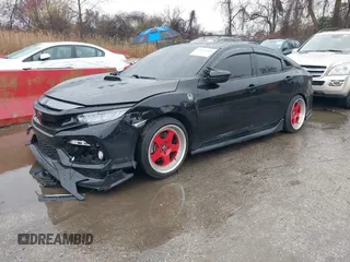 2019 Honda Civic Si z VIN 2HGFC1E51KH704185, wystawiony jako IAAI lot #41855464 z przebiegiem 110 106 mil mil oraz . Historia ofert i sprzedaży dostępna na DreamBid. Obrazek 2.