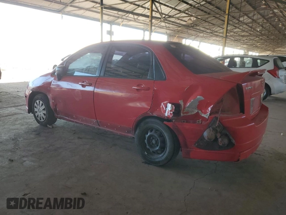 2005 Suzuki Aerio S z VIN JS2RA62S555256527, wystawiony jako Copart lot #86038284 z przebiegiem 135 296 mil mil oraz Szkoda całkowita • Salvage title. Historia ofert i sprzedaży dostępna na DreamBid. Obrazek 2.