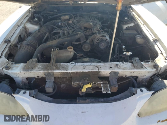 1998 Ford Mustang with VIN 1FAFP4448WF269580, listed as a Copart auction lot 54861155 with 304,869 mi miles and Salvage title. Bid and sale history available at DreamBid. Image 11.