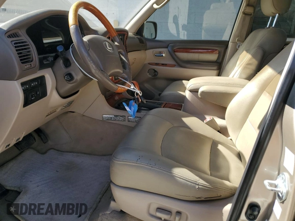 2002 Lexus LX 470 z VIN JTJHT00W523513337, wystawiony jako Copart lot #47001735 z przebiegiem 261 108 mil mil oraz Szkoda całkowita • Salvage title. Historia ofert i sprzedaży dostępna na DreamBid. Obrazek 7.
