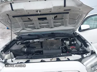 2019 Toyota Tacoma SR z VIN 3TMCZ5AN0KM232852, wystawiony jako IAAI lot #42178269 z przebiegiem 71 545 mil mil oraz . Historia ofert i sprzedaży dostępna na DreamBid. Obrazek 10.