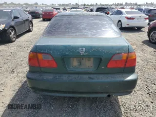 1999 Honda Civic VP z VIN 2HGEJ6618XH522162, wystawiony jako Copart lot #54427665 z przebiegiem 320 807 mil mil oraz Szkoda całkowita • Salvage title. Historia ofert i sprzedaży dostępna na DreamBid. Obrazek 6.