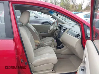 2007 Nissan Versa 1.8 S with VIN 3N1BC13EX7L364889, listed as a IAAI auction lot 42008734 with 147,613 mi miles. Bid and sale history available at carsss.com. Image 5.