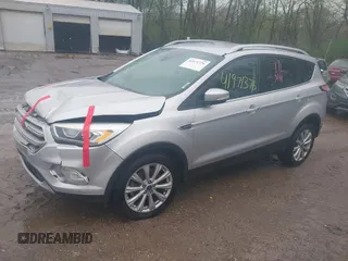 2017 Ford Escape Titanium with VIN 1FMCU0J96HUC21987, listed as a IAAI auction lot 41971376 with 97,488 mi miles and . Bid and sale history available at DreamBid. Image 2.