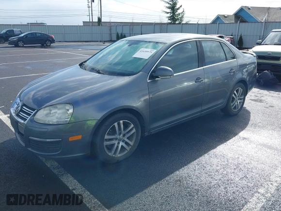 2005 Volkswagen Jetta 2.5L z VIN 3VWSF71K05M601944, wystawiony jako IAAI lot #41659975 z przebiegiem 230 001 mil mil oraz . Historia ofert i sprzedaży dostępna na DreamBid. Obrazek 2.