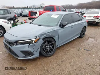 2023 Honda Civic Sedan Sport with VIN 2HGFE2F58PH528595, listed as a IAAI auction lot 41666370 with 28,802 mi miles. Bid and sale history available at carsss.com. Image 2.