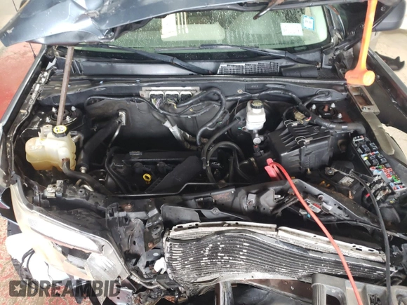 2010 Mercury Mariner z VIN 4M2CN9B70AKJ24170, wystawiony jako Copart lot #49241535 z przebiegiem 118 661 mil mil oraz Szkody całkowita. Historia ofert i sprzedaży dostępna na DreamBid. Obrazek 12.