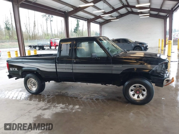 1989 Ford Ranger with VIN 1FTCR15T2KPB41366, listed as a IAAI auction lot 41980273 with 57,772 mi miles. Bid and sale history available at carsss.com. Image 13.