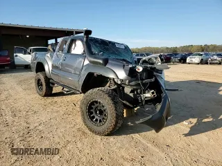 2015 Toyota Tacoma z VIN 5TFUX4EN6FX030970, wystawiony jako Copart lot #50354015 z przebiegiem Nie podano mil oraz Szkoda całkowita • Salvage title. Historia ofert i sprzedaży dostępna na DreamBid. Obrazek 11.