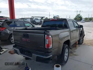 2015 GMC Canyon 2WD SLE with VIN 1GTG5BE30F1221017, listed as a IAAI auction lot 41812666 with 132,277 mi miles and . Bid and sale history available at carsss.com. Image 4.