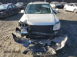 2009 Mercury Mariner Premier z VIN 4M2CU97G89KJ20990, wystawiony jako Copart lot #42984005 z przebiegiem Nie podano mil oraz Szkoda całkowita • Salvage title. Historia ofert i sprzedaży dostępna na DreamBid. Obrazek 5.