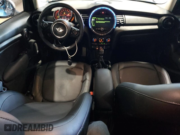 2017 MINI Hardtop 4 Door Cooper with VIN WMWXU1C58H2E17768, listed as a Copart auction lot 55128445 with 114,957 mi miles and Salvage Title. Bid and sale history available at DreamBid. Image 8.
