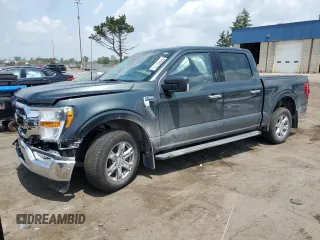 2021 Ford F-150 XL with VIN 1FTEW1CP2MKE38029, listed as a Copart auction lot 60890115 with 77,386 mi miles and Clean title. Bid and sale history available at DreamBid. Image 1.