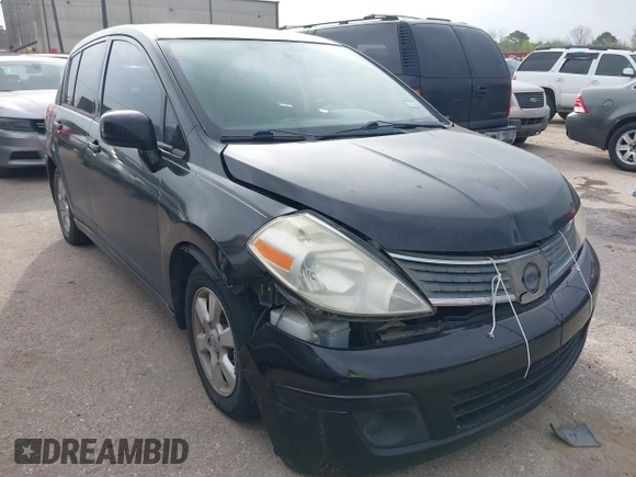 2009 Nissan Versa 1.8 SL with VIN 3N1BC13E59L496882, listed as a IAAI auction lot 41798734 with 210,907 mi miles. Bid and sale history available at carsss.com. Image 1.