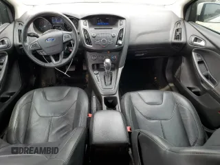 2016 Ford Focus SE with VIN 1FADP3F26GL287849, listed as a Copart auction lot 59980545 with 103,065 mi miles and Salvage title. Bid and sale history available at DreamBid. Image 8.