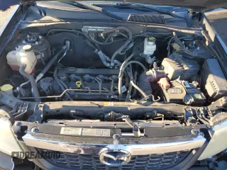 2011 Mazda Tribute Touring with VIN 4F2CY0C70BKM02624, listed as a Copart auction lot 75472464 with 172,077 mi miles and Salvage Title. Bid and sale history available at carsss.com. Image 12.