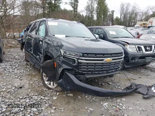2023 Chevrolet Suburban Premier with VIN 1GNSCFKD1PR364024, listed as a IAAI auction lot 41222865 with 61,355 mi miles. Bid and sale history available at carsss.com. Image 1.