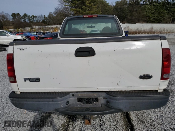 2003 Ford F-150 XL z VIN 1FTRF18W53NB45997, wystawiony jako Copart lot #42451525 z przebiegiem 149 166 mil mil oraz Szkoda całkowita • Salvage title. Historia ofert i sprzedaży dostępna na DreamBid. Obrazek 6.