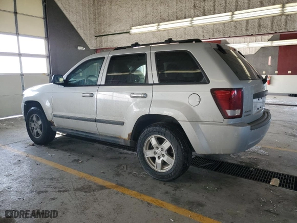 2007 Jeep Grand Cherokee Laredo with VIN 1J8GR48K67C652382, listed as a Copart auction lot 45310295 with 266,618 mi miles and Salvage Title. Bid and sale history available at carsss.com. Image 2.