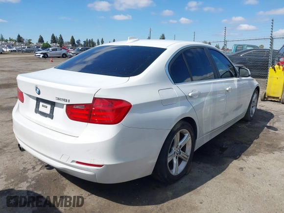 2015 BMW 3 Series 328i with VIN WBA3C1C5XFK117788, listed as a IAAI auction lot 41752178 with 154,030 mi miles and . Bid and sale history available at carsss.com. Image 4.