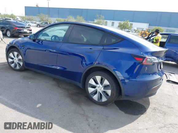 2020 Tesla Model Y Long Range with VIN 5YJYGDEE1LF006227, listed as a IAAI auction lot 42100833 with 49,761 mi miles and . Bid and sale history available at DreamBid. Image 3.