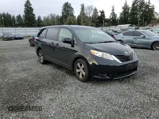 2012 Toyota Sienna with VIN 5TDKA3DC0CS014719, listed as a Copart auction lot 88358865 with 118,901 mi miles and Salvage Title. Bid and sale history available at DreamBid. Image 11.