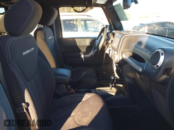 2014 Jeep Wrangler Unlimited Rubicon X with VIN 1C4BJWFG3EL134522, listed as a IAAI auction lot 41221381 with 66,897 mi miles and . Bid and sale history available at DreamBid. Image 5.