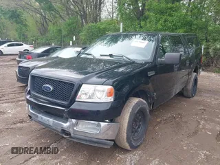 2004 Ford F-150 XLT with VIN 1FTRW14W04KC68874, listed as a IAAI auction lot 42159087 with 134,141 mi miles. Bid and sale history available at carsss.com. Image 2.