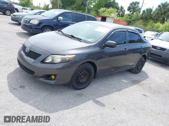 2010 Toyota Corolla with VIN 1NXBU4EE7AZ237289, listed as a IAAI auction lot 41877935 with 198,861 mi miles. Bid and sale history available at carsss.com. Image 16.