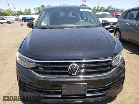2023 Volkswagen Tiguan SE R-Line Black with VIN 3VV8B7AX2PM121851, listed as a Copart auction lot 59206135 with 23,723 mi miles and Salvage title. Bid and sale history available at DreamBid. Image 5.